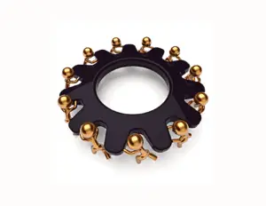 A group of people involved in a business process, standing around a gear wheel.