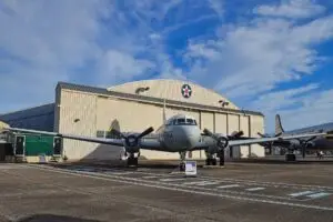 An airplane parked near an airbase