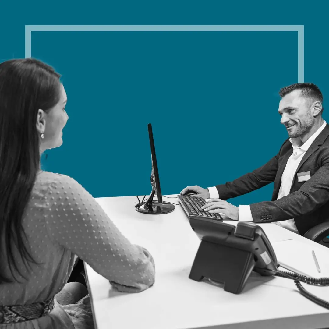Woman having a consultation with a clerk.