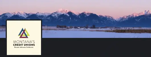 Montana's Credit Unions: snowy mountain landscape.